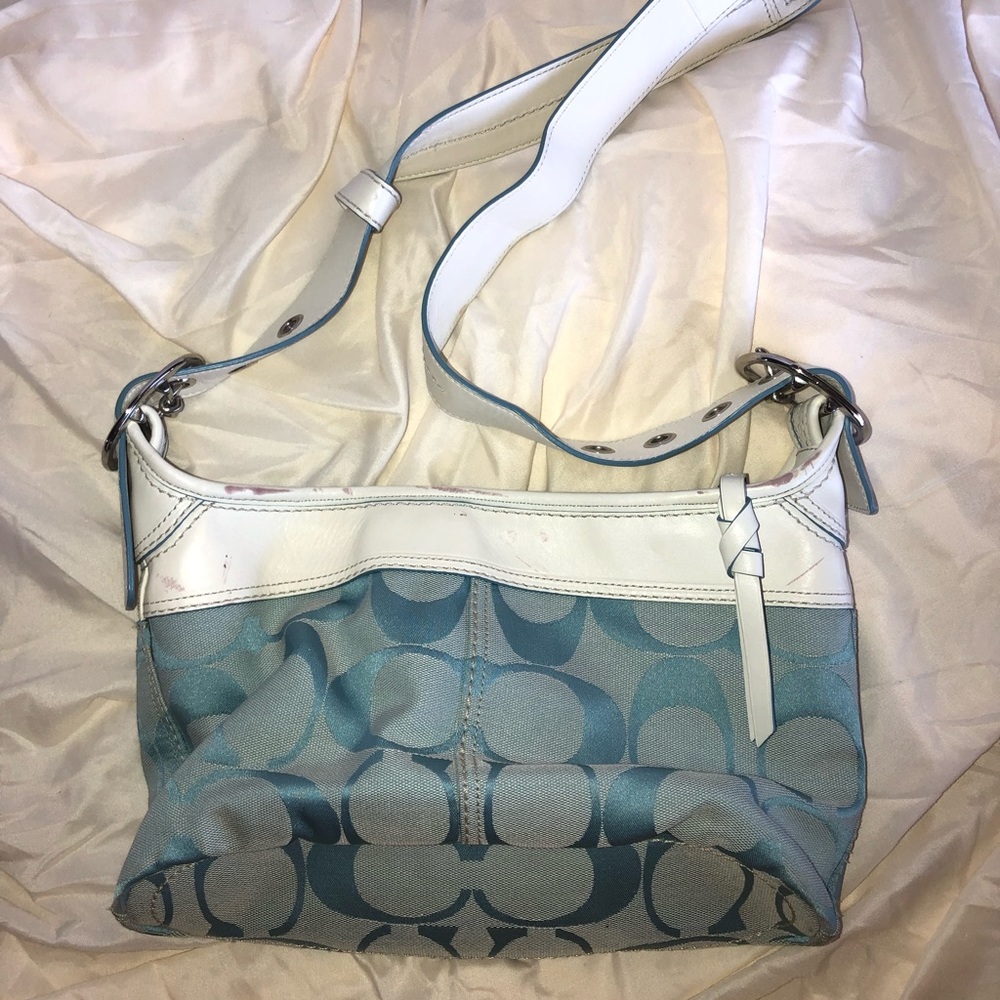 white and blue coach purse